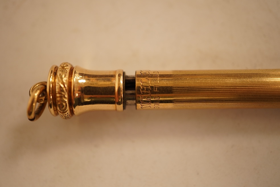 A 9ct gold propelling pencil with engine turned decoration and inset bloodstone terminal and a plain gold filled propelling pencil, largest 11.5cm in length